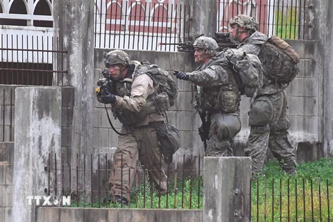 Binh sỹ Mỹ tham gia cuộc tập trận chung với lực lượng Hàn Quốc tại trường bắn Rodriguez ở Pocheon, cách thủ đô Seoul khoảng 70km về phía Đông Bắc. (Nguồn: AFP/TTXVN) 