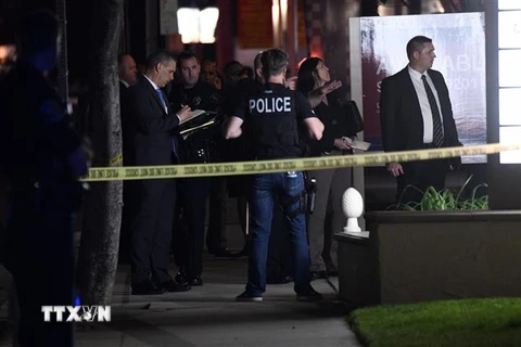 Cảnh sát điều tra tại hiện trường một vụ xả súng ở Orange, California, Mỹ. (Nguồn: AFP/TTXVN) 