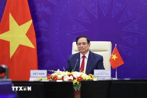 Thủ tướng Chính phủ Phạm Minh Chính tham dự Hội nghị quốc tế về Tương lai châu Á lần thứ 26 tại điểm cầu Hà Nội. (Ảnh: Dương Giang/TTXVN) 