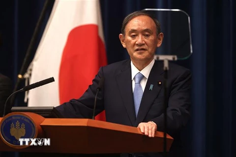 Thủ tướng Nhật Bản Yoshihide Suga tại cuộc họp báo ở Tokyo. (Nguồn: AFP/TTXVN) 