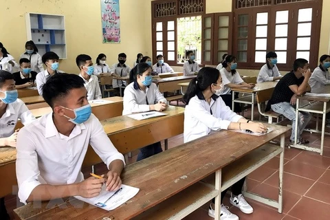 Thí sinh dự thi tốt nghiệp Trung học phổ thông năm 2020. (Ảnh: Quang Cường/TTXVN) 