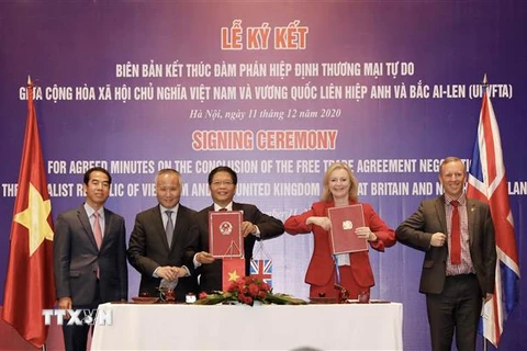 Quang cảnh Lễ ký kết Biên bản Kết thúc đàm phán Hiệp định Thương mại Tự do giữa Việt Nam với Vương quốc Liên hiệp Anh và Bắc Ireland (UKVFTA). (Ảnh: Trần Việt/TTXVN) 