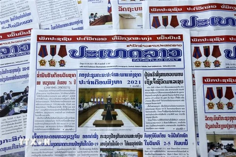 Trang nhất tờ PathetLao Daily của Thông Tấn xã Lào số ra ngày 1/9 đã trang trọng đăng bài xã luận mang tiêu đề Chào mừng 76 năm Ngày Quốc khánh Việt Nam. (Ảnh: Phạm Kiên/TTXVN) 