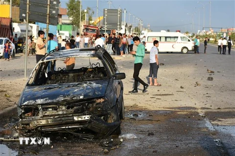Hiện trường một vụ tấn công tại Iraq. (Ảnh: AFP/TTXVN) 