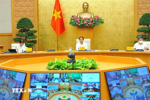 Phó Thủ tướng Lê Văn Thành phát biểu chỉ đạo hội nghị. (Ảnh: Minh Đức/TTXVN) 