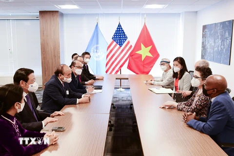 Chủ tịch nước Nguyễn Xuân Phúc gặp gỡ bạn bè cánh tả Hoa Kỳ. (Ảnh: Thống Nhất/TTXVN)