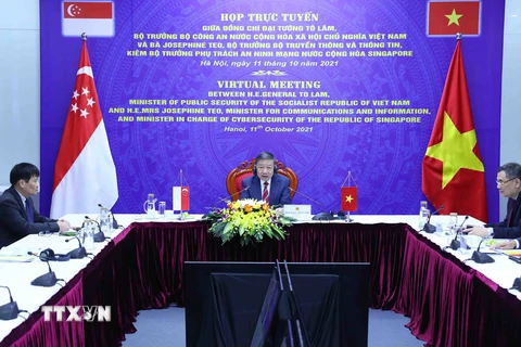 Đại tướng Tô Lâm, Ủy viên Bộ Chính trị, Bộ trưởng Bộ Công an, tham dự cuộc họp trực tuyến tại điểm cầu Hà Nội. (Ảnh: Phạm Kiên/TTXVN) 