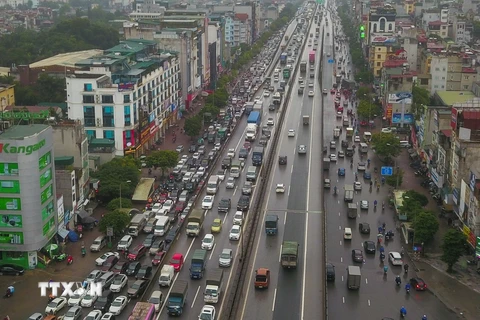 [Photo] Hà Nội: Đường vành đai 3 ùn tắc dù đã qua giờ cao điểm