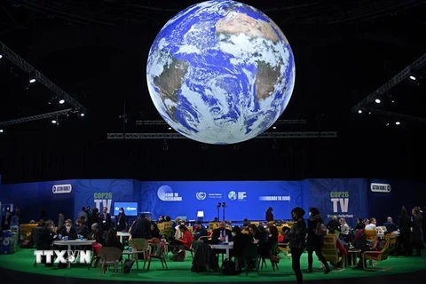 Đại biểu dự Hội nghị COP26 tại Glasgow, Scotland ngày 2/11/2021. (Ảnh: AFP/TTXVN) 