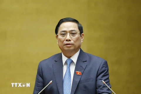 Hình ảnh Thủ tướng Phạm Minh Chính trả lời chất vấn tại Quốc hội