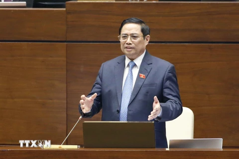 Thủ tướng Chính phủ Phạm Minh Chính trả lời chất vấn các vị đại biểu Quốc hội. (Ảnh: Doãn Tấn/TTXVN) 