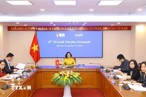 Đoàn đại biểu Thông tấn xã Việt Nam do Tổng giám đốc Vũ Việt Trang dẫn đầu tham dự Hội nghị tại điểm cầu Hà Nội. (Ảnh: Văn Điệp/TTXVN) 