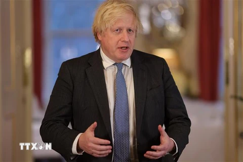 Thủ tướng Anh Boris Johnson phát biểu tại London, Anh, ngày 21/12/2021. (Ảnh: THX/TTXVN) 