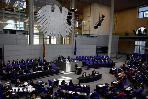 Thủ tướng Đức Olaf Scholz phát biểu trước Quốc hội liên bang ở Berlin, ngày 23/3/2022. (Ảnh: AFP/TTXVN) 