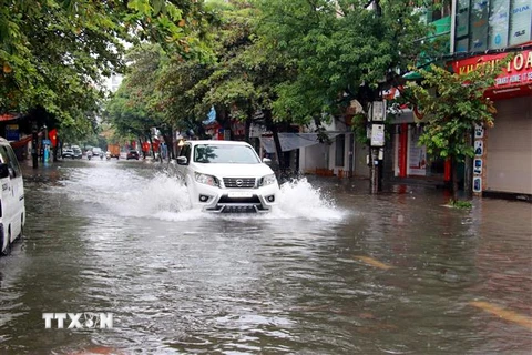 Đường Quang Trung, thành phố Nam Định, ngập sâu sau cơn mưa hôm 9/9. (Ảnh: Nguyễn Lành/TTXVN) 