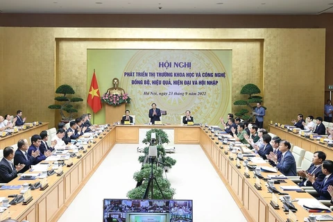 Hình ảnh Thủ tướng chủ trì hội nghị phát triển khoa học, công nghệ. (Ảnh: Dương Giang/TTXVN)