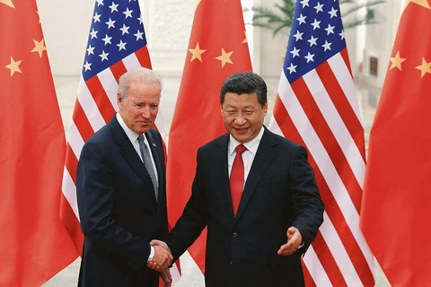 Tổng thống Mỹ Joe Biden (trái) và Chủ tịch Trung Quốc Tập Cận Bình. (Nguồn: Reuters)