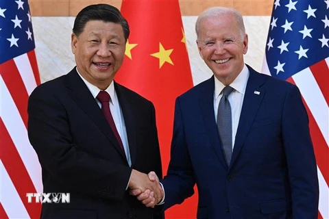 Tổng thống Mỹ Joe Biden (phải) và Chủ tịch Trung Quốc Tập Cận Bình tại cuộc gặp trước thềm Hội nghị thượng đỉnh G20 ở Bali, Indonesia, ngày 14/11/2022. (Ảnh: AFP/TTXVN) 