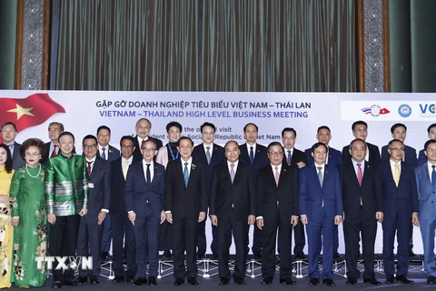 Chủ tịch nước Nguyễn Xuân Phúc với các doanh nghiệp tiêu biểu Việt Nam-Thái Lan. (Ảnh: Thống Nhất/TTXVN)