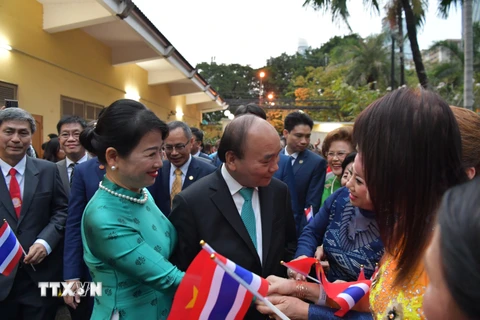 Chủ tịch nước Nguyễn Xuân Phúc gặp gỡ kiều bào tại Thái Lan. (Ảnh: Huy Tiến/TTXVN) 