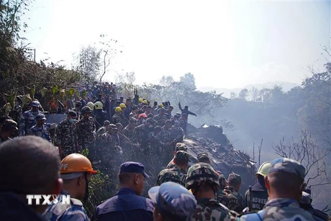 Hiện trường vụ rơi máy bay ở Pokhara, miền Trung Nepal ngày 15/1/2023. (Ảnh: AFP/TTXVN)