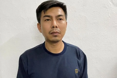 Nguyễn Mạnh Tuấn tại cơ quan công an. (Nguồn: Sài Gòn Giải Phóng)