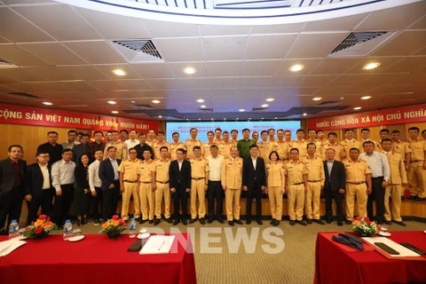 Cục Đăng kiểm Việt Nam tiếp nhận 50 cảnh sát giao thông hỗ trợ kiểm định xe cơ giới. (Ảnh: Quang Toàn/TTXVN)