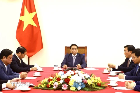 Thủ tướng Phạm Minh Chính điện đàm với Thủ tướng Trung Quốc Lý Cường. (Ảnh: Lâm Khánh/TTXVN)
