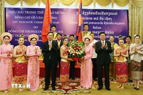 Tiệc chiêu đãi trọng thể chào mừng Chủ tịch nước Võ Văn Thưởng tại Lào