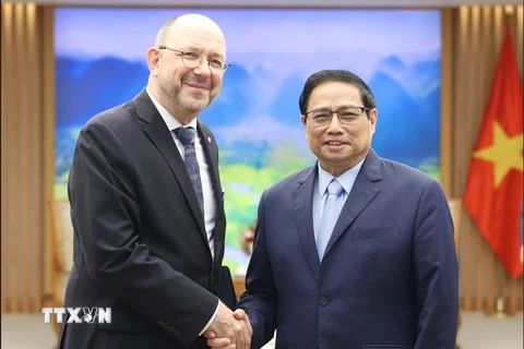 Thủ tướng Phạm Minh Chính tiếp Đại sứ Thụy Sĩ tại Việt Nam Thomas Gass. (Ảnh: Dương Giang/TTXVN)