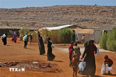 Người tị nạn tại một trại tạm ở tỉnh Idlib, Syria. (Ảnh: AFP/TTXVN)