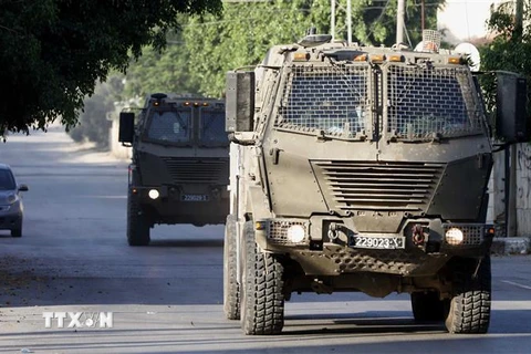 Xe quân sự Israel được triển khai tại thành phố Jenin, Bờ Tây, ngày 3/7/2023. (Ảnh: THX/TTXVN)