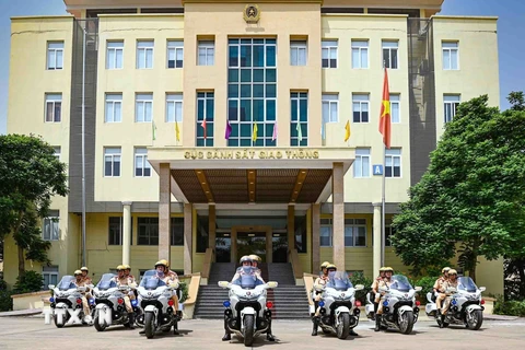 30 siêu môtô được cấp phát cho Cảnh sát giao thông của 11 tỉnh, thành phố sẵn sàng đón, dẫn đoàn lãnh đạo Đảng, Nhà nước và khách quốc tế. (Ảnh: Phạm Kiên/TTXVN)