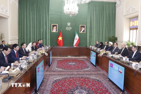 Quang cảnh hội đàm giữa Chủ tịch Quốc hội Vương Đình Huệ với Chủ tịch Quốc hội Iran Mohammad Bagher Ghalibaf. (Ảnh: Doãn Tấn/TTXVN)