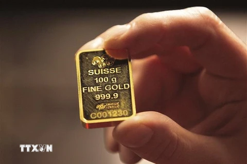 Vàng miếng được bán tại cửa hàng ở Dublin, Ireland. (Ảnh: AFP/TTXVN)