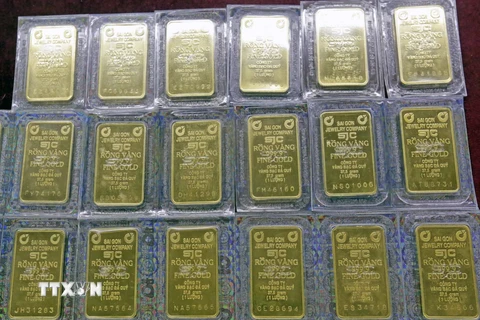 Vàng miếng SJC bày bán tại Công ty Vàng bạc Agribank. (Ảnh: Trần Việt - TTXVN)