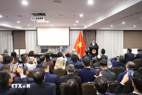 Thủ tướng Phạm Minh Chính phát biểu tại buổi gặp cộng đồng người Việt Nam tại Australia. (Ảnh: Dương Giang/TTXVN)