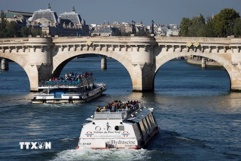 Lễ khai mạc Olympic Paris sẽ được tổ chức trên sông Seine. (Nguồn: AFP/TTXVN)