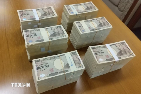 Đồng tiền mệnh giá 10000 yen của Nhật Bản. (Ảnh: AFP/TTXVN)