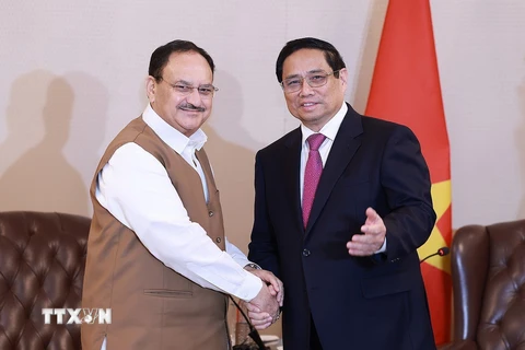 Thủ tướng Phạm Minh Chính tiếp Chủ tịch Đảng Nhân dân Ấn Độ (BJP) Jagat Prakash Nadda. (Ảnh: Dương Giang/TTXVN)