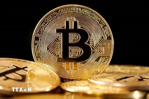 Đồng tiền kỹ thuật số bitcoin. (Ảnh: Getty Images/TTXVN)