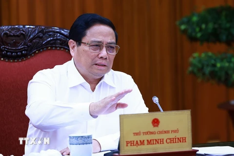 Thủ tướng Phạm Minh Chính chủ trì buổi làm việc. (Ảnh: Dương Giang/TTXVN)