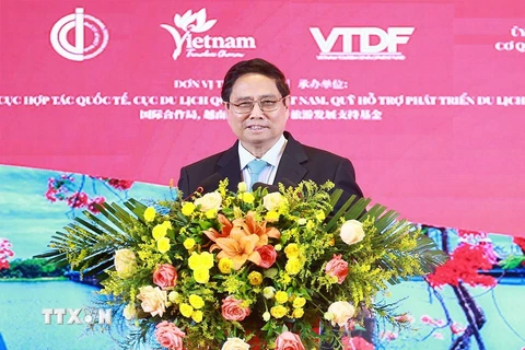 Thủ tướng Phạm Minh Chính phát biểu tại Chương trình giới thiệu Văn hoá và Du lịch Việt Nam tại thành phố Trùng Khánh. (Ảnh: Dương Giang/TTXVN)