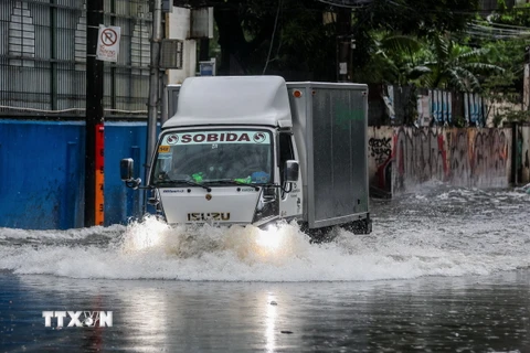 Cảnh ngập lụt sau bão tại tỉnh Quezon, Philippines, ngày 24/10/2024. (Ảnh: THX/TTXVN)