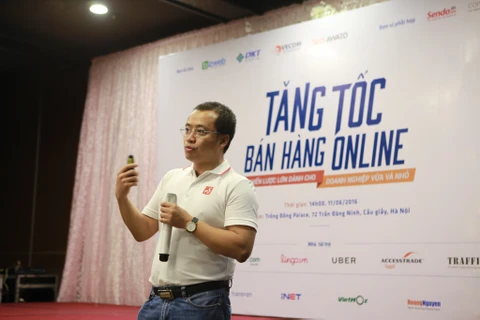 Ông Trần Hải Linh chia sẻ các vấn đề doanh nghiệp gặp phải khi tham gia mô hình thương mại điện tử. (Ảnh: PV/Vietnam+)