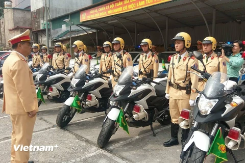 Lực lượng Cảnh sát giao thông đã sẵn sàng các phương tiện, công cụ hỗ trợ làm nhiệm vụ dẫn đoàn. (Ảnh: PV/Vietnam+)