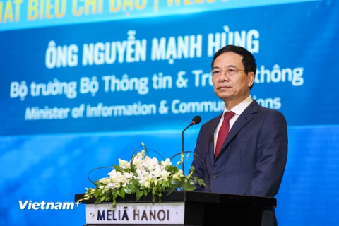 Bộ trưởng Nguyễn Mạnh Hùng phát biểu tại Hội thảo. (Ảnh: Minh Sơn/Vietnam+)