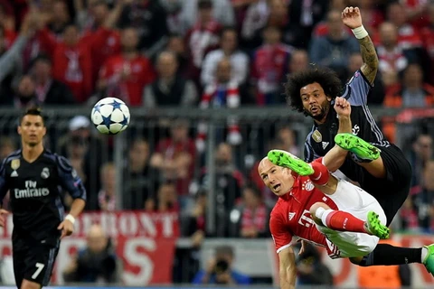 Marcelo thi đấu cực kỳ xuất sắc "bắt chết" Robben (Ảnh: Nguồn Fcb.de) 