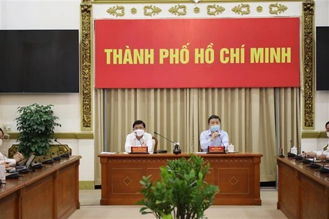 Lãnh đạo UBND TP.Hồ Chí Minh tại cuộc họp Ban Chỉ đạo phòng chống dịch bệnh Covid-19 TP. Hồ Chí Minh chiều 9/2.(Ảnh: TTXVN phát)