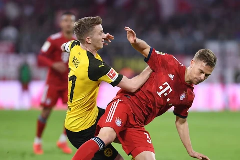 Kimmich truy cản Reus ở trận đấu mà Bayern đã giành chiến thắng 5-0 vào năm 2019, qua đó xoay chuyển kết quả mùa giải và có đĩa bạc lần thứ 7 liên tiếp. (Nguồn: FcB.com)